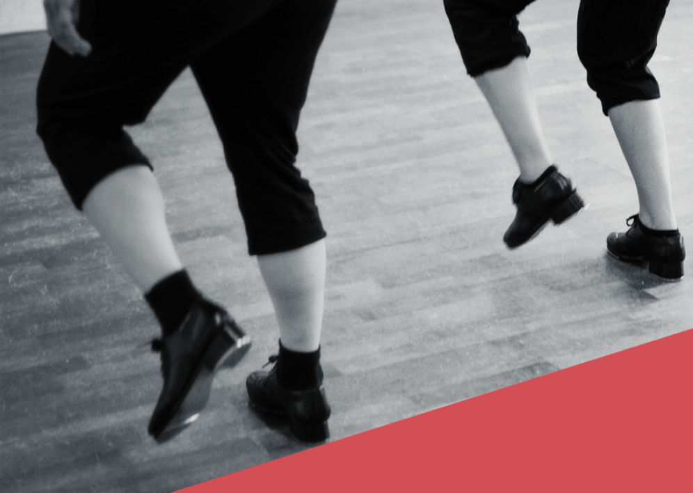 Backstage Studio: Legs and shoes of tap dancers during class