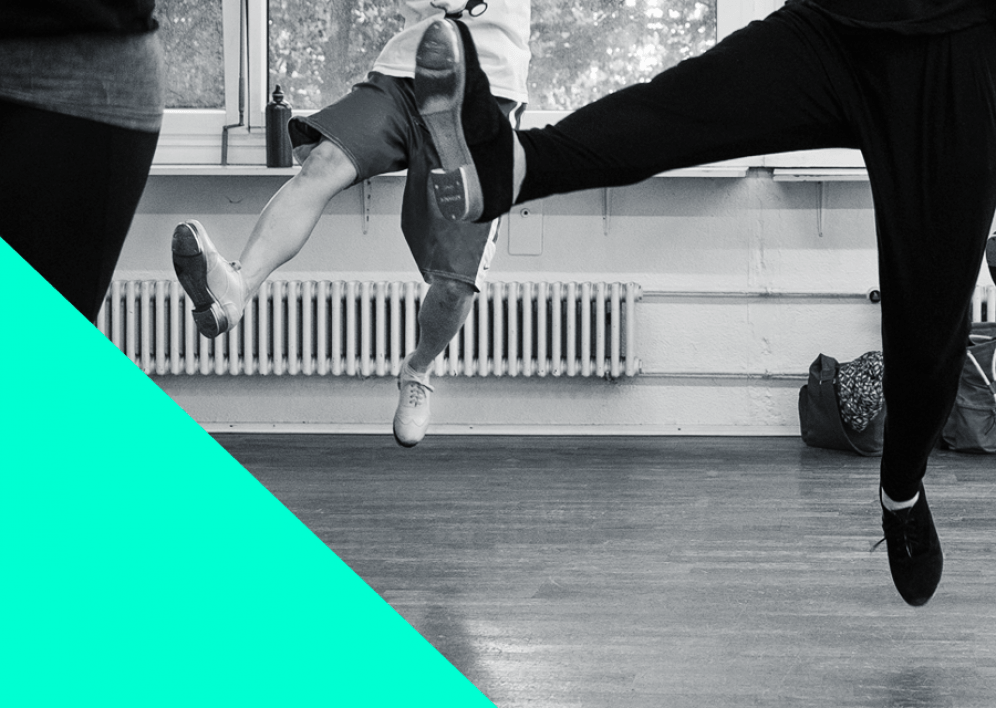 Backstage Studio: Legs and shoes of tap dancers during class